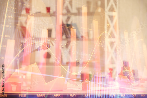 Double exposure of stock market graph drawing and office interior background. Concept of financial analysis.