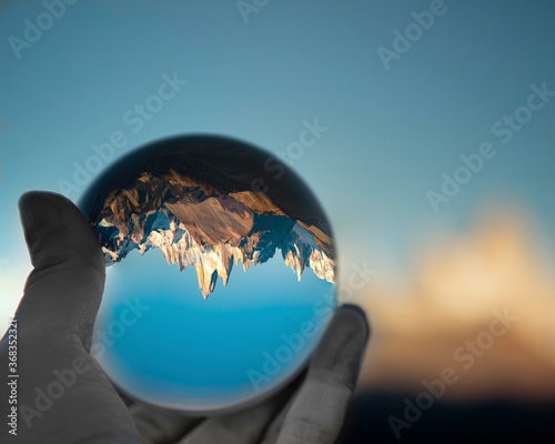 Fototapeta Naklejka Na Ścianę i Meble -  Reflection of Mt Fitz Roy Mountain Range in a photo glass ball. 