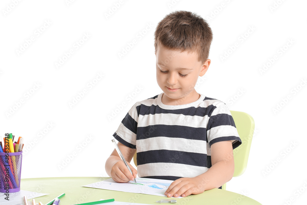 Cute little boy coloring pictures on white background Cute little boy coloring pictures on white background