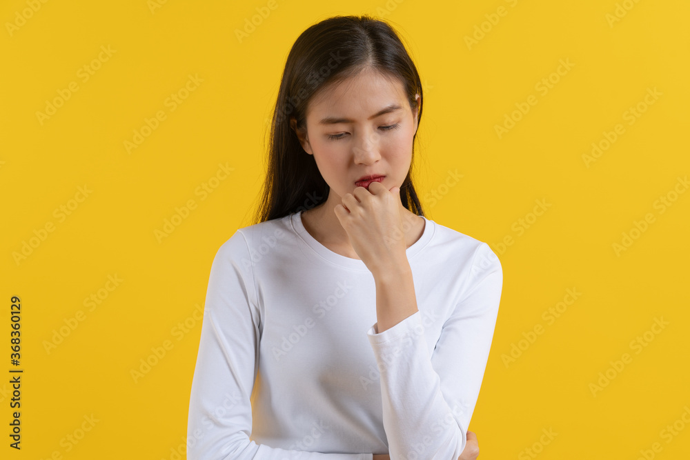 Asian young woman think and doubt worry. Asian young woman think and doubt worry.