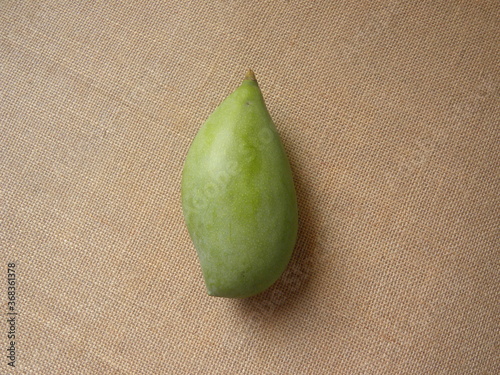 Green raw whole Totapuri mango photo