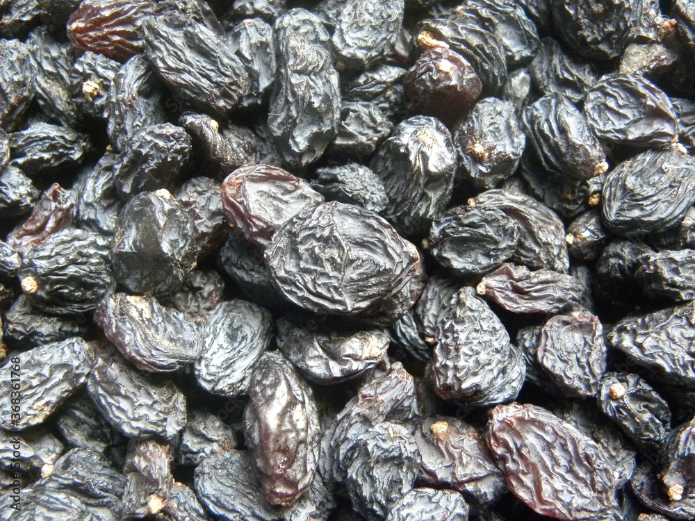Black color raw whole dried raisin Black color raw whole dried raisin