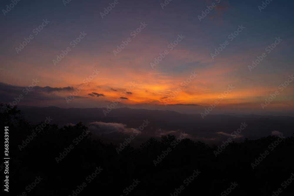 Beautiful mountain view with fog, sunrise scene, Doi Samer Dao mountain in Nan province, Thailand Beautiful mountain view with fog, sunrise scene, Doi Samer Dao mountain in Nan province, Thailand