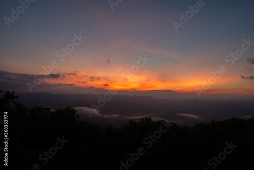 Beautiful mountain view with fog, sunrise scene, Doi Samer Dao mountain in Nan province, Thailand