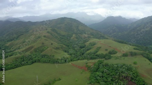Drone shot of the green mountains in the Monseñor Nouel province, Dominican Republic photo