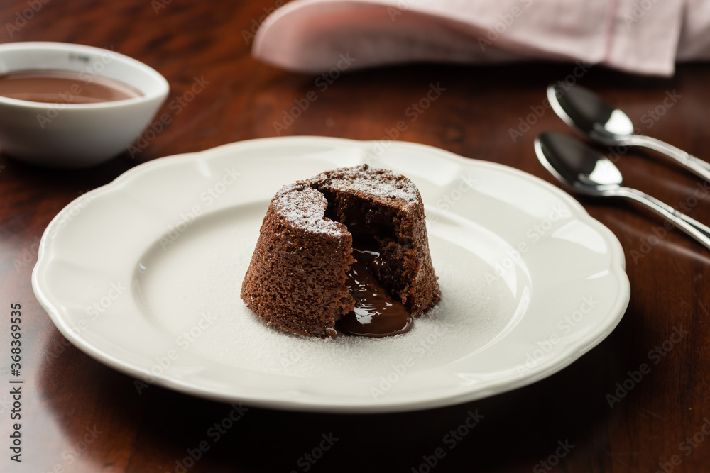 chocolate petit gateau and cocoa with hot melted inside chocolate petit gateau and cocoa with hot melted inside