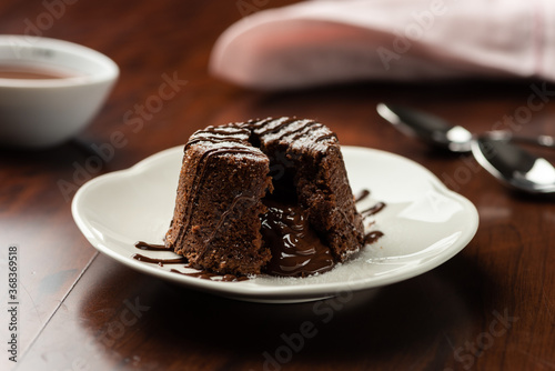 chocolate petit gateau and cocoa with hot melted inside photo