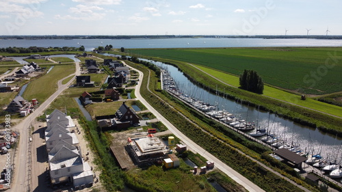 Harbor spot Numansdorp in the Netherlands, Aerial view of harbor view and new housing estate.