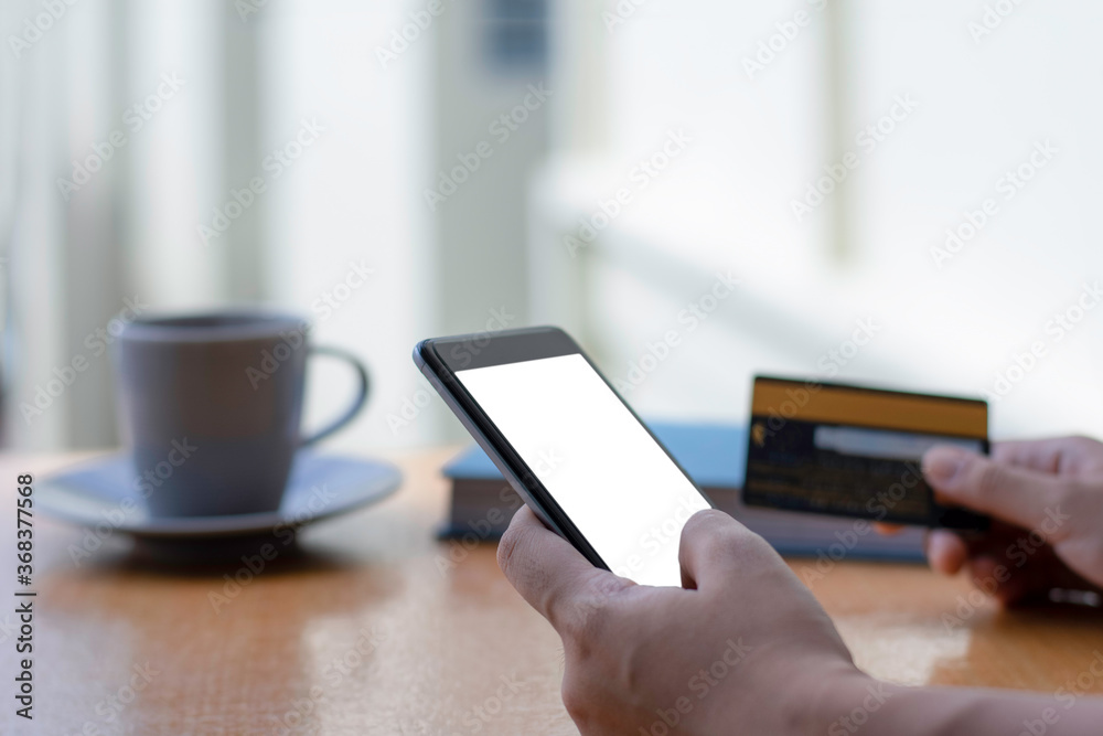 woman hand using smartphone and credit card. woman hand using smartphone and credit card.
