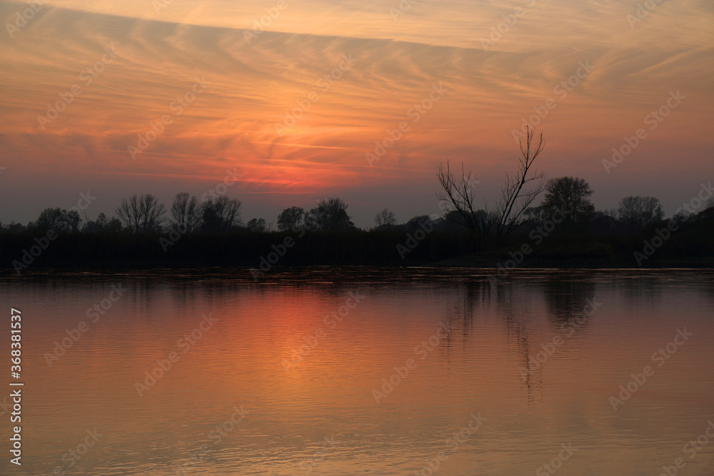 Colorful sunset by the Odra River, Poland. Colorful sunset by the Odra River, Poland.