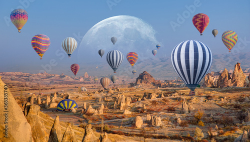 Hot air balloon flying over spectacular Cappadocia 