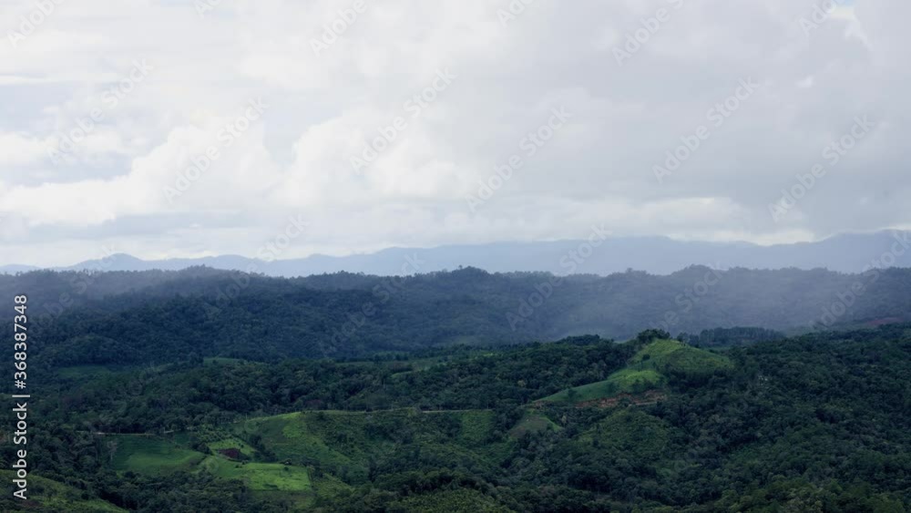 Time lapse of cloudy sky with thunderstorm and rain over the mountains. Time lapse of cloudy sky with thunderstorm and rain over the mountains.