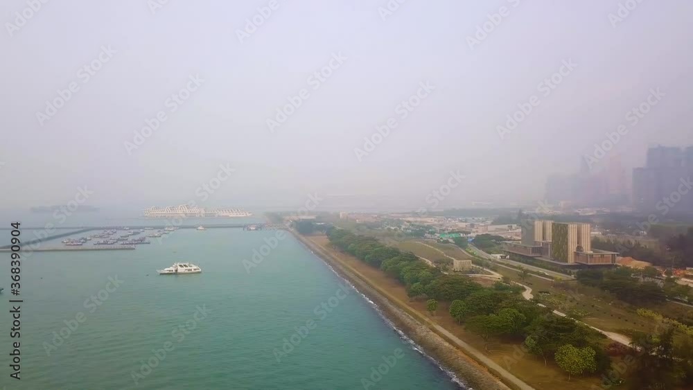 Aerial shot of hazy coastal area  Singapore