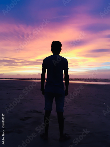 silhouette boy with Colourful sky