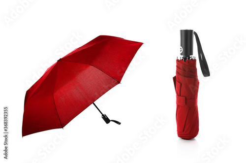 Blank Red Foldable Umbrella for mock up. Isolated on White Background. Clear light weight umbrella for template. Design template for Branding, Advertise etc.  photo
