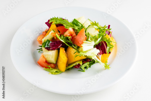 vegetable salad on the white plate