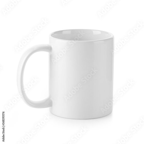White Ceramic Mug With Handle Isolated on White Background. Used for Hot and Cold Beverage. Design Template for Mock-up. Studio Shoot. Front View