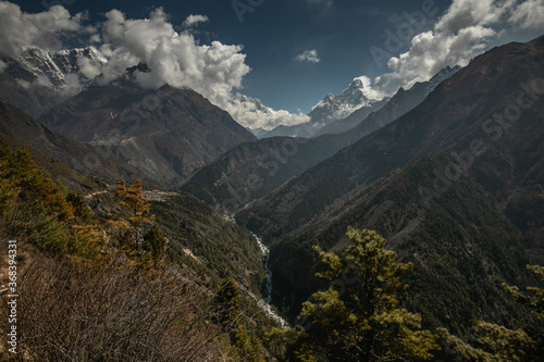 Everest base camp trekking. high mountains in Nepal. blue sky. high altitude landscape. High quality photo. mountain river. beautiful valley. 