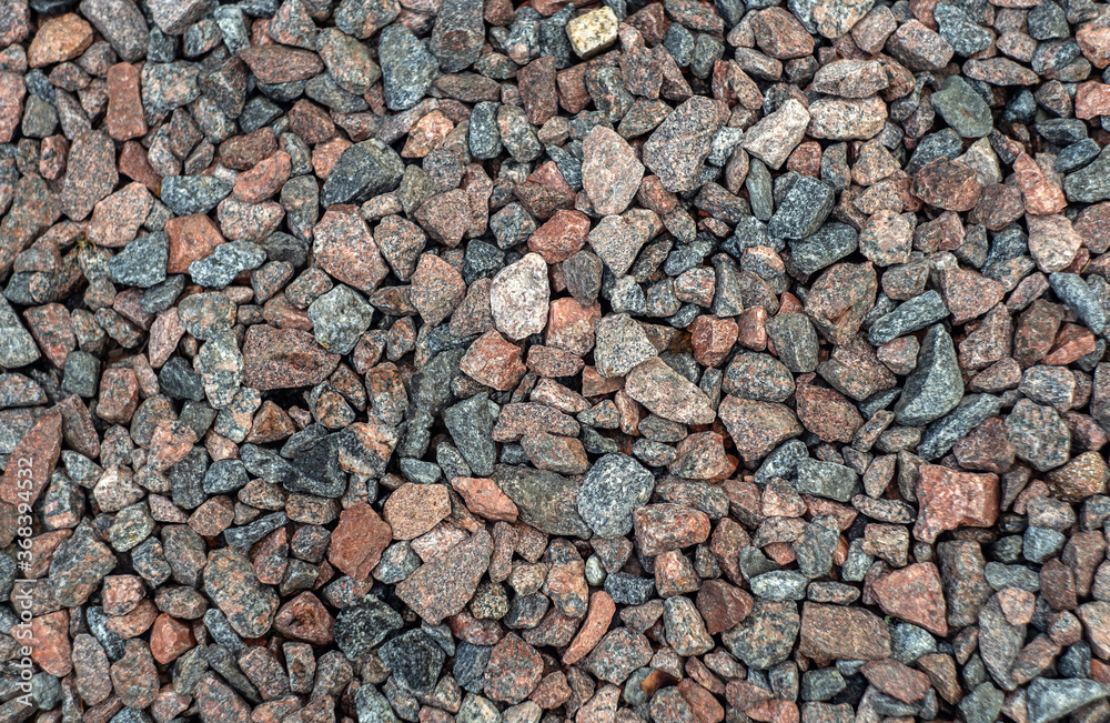 texture of red and brown granite stones scattered on the ground texture of red and brown granite stones scattered on the ground