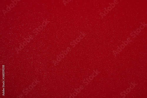 Red glittering glitter blurred background