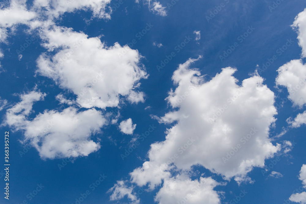 Obraz premium Blue sky background. Blue sky with white clouds