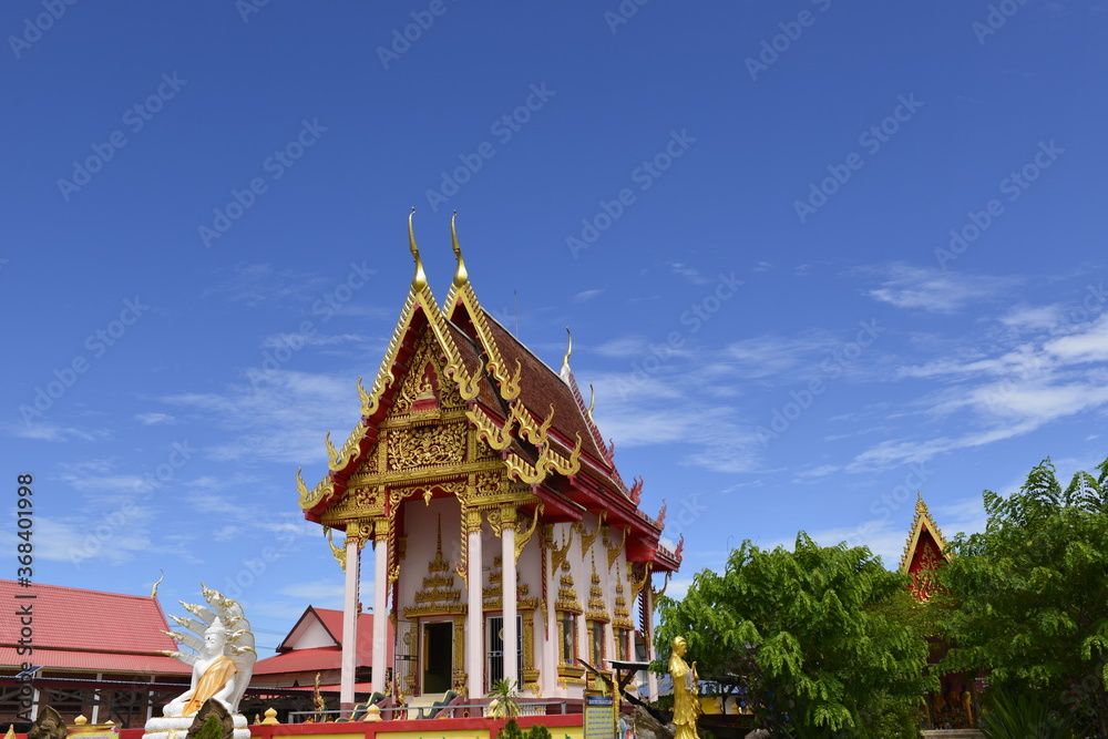 Fototapeta premium Wat HaiSok Buddhist Sanctuary with Blue Sky background, NongKhai province Thailand. 