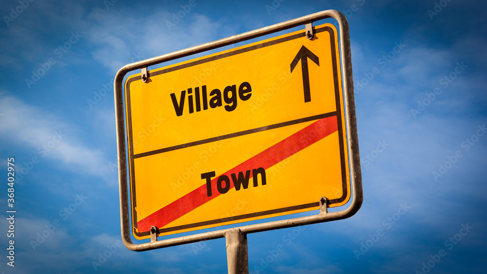 Street Sign to Village versus Town Street Sign to Village versus Town