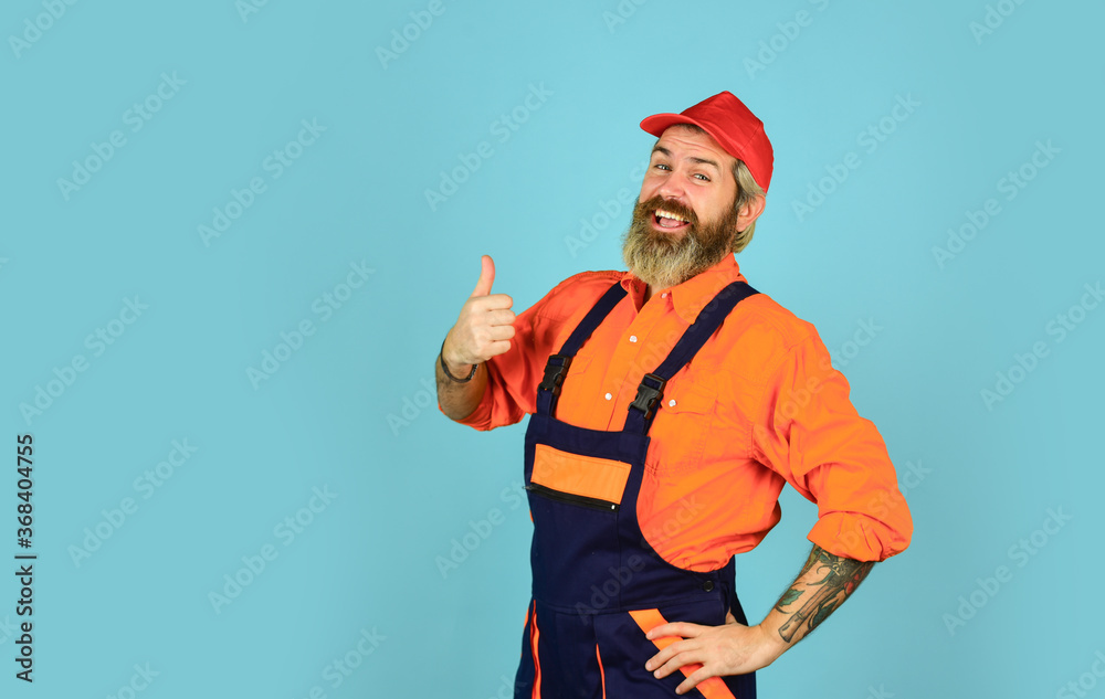 Renovation concept. Man skillful worker. Laborer. Repairman experienced worker. Help services. Handsome construction worker. Fixing broken technics at home. Electrician plumber handyman. Call master Renovation concept. Man skillful worker. Laborer. Repairman experienced worker. Help services. Handsome construction worker. Fixing broken technics at home. Electrician plumber handyman. Call master