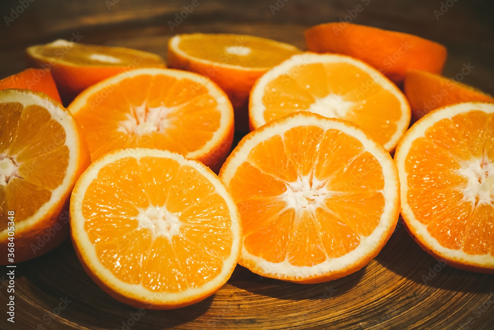 Bunch of fresh sliced oranges on a tray Bunch of fresh sliced oranges on a tray
