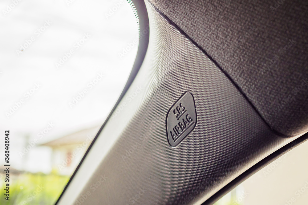 Safety side curtain airbag sign in new modern car Safety side curtain airbag sign in new modern car