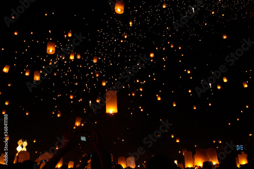 Launching floating sky lanterns in Chiang Mai, Loykratong Festival