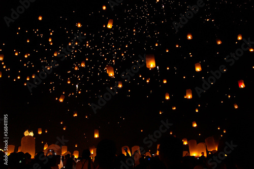 Launching floating sky lanterns in Chiang Mai, Loykratong Festival