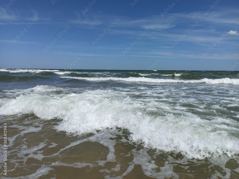 waves crashing on the beach