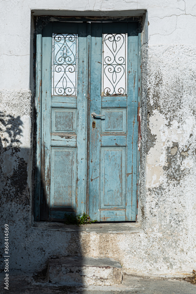 old style wooden doors and windows in greece santorini