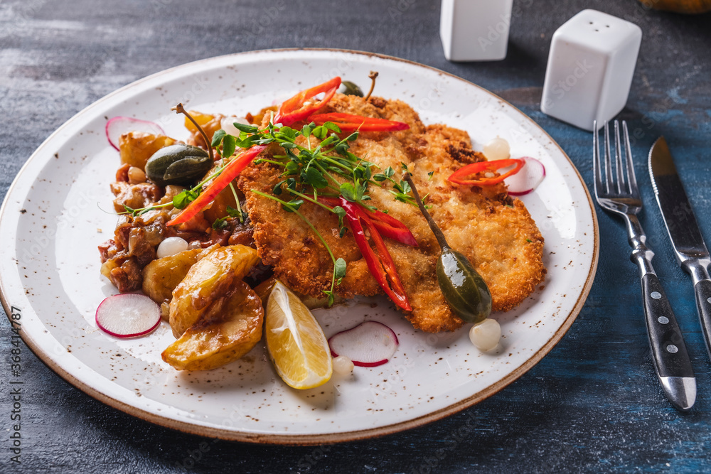 Crispy chicken in breading with potato Crispy chicken in breading with potato
