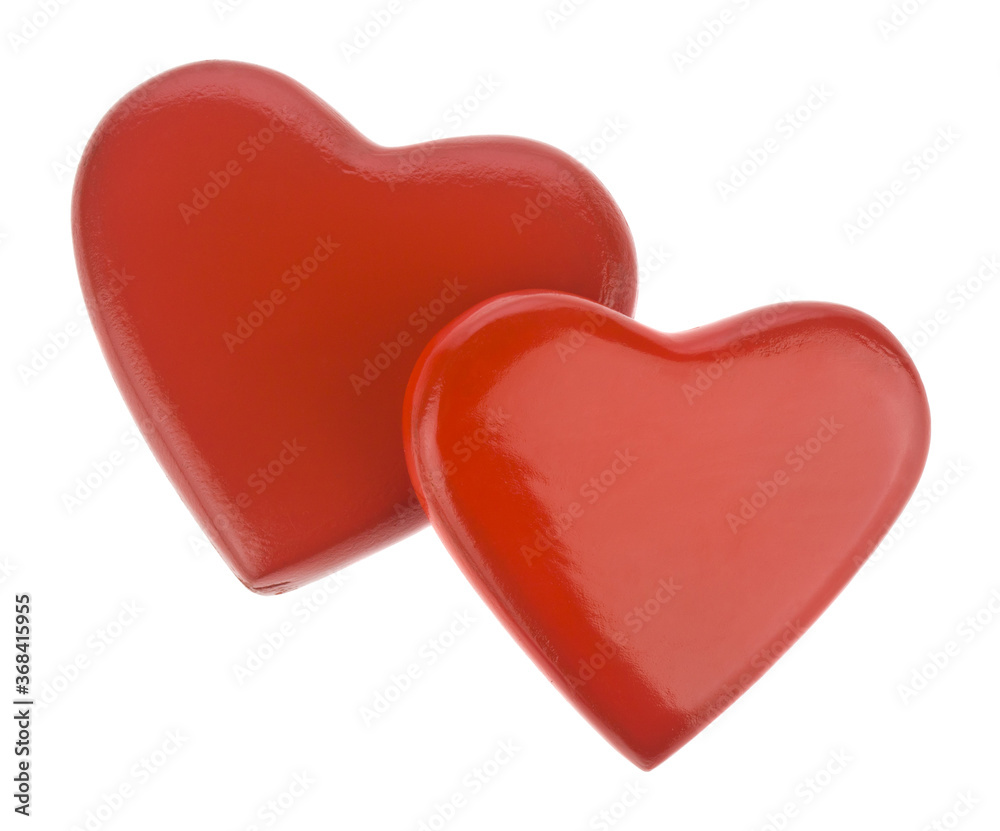 Two red hearts isolated on white background close-up.