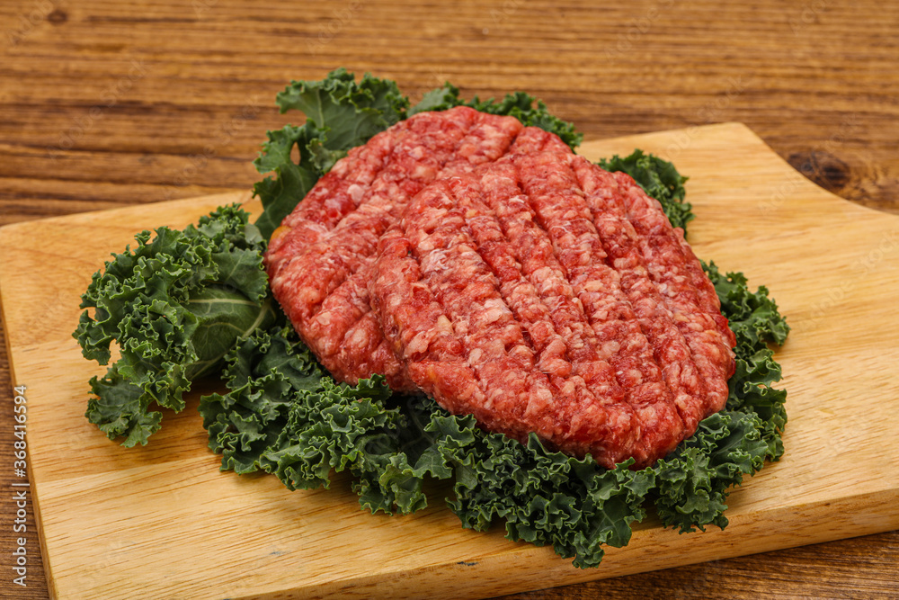 Raw beef burger cutlet for cooking
