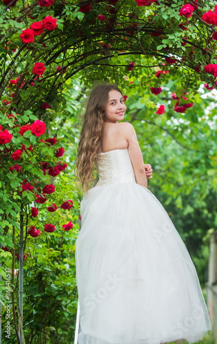 Innocent wedding outlook. girls party dress. female fashion salon. little beauty in blossoming garden. park jasmine flower. beautiful prom queen. look as princess. bridesmaid. childhood happiness