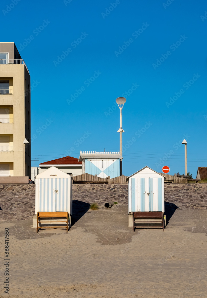 Two quaint beach cabins in Hardelot, France.