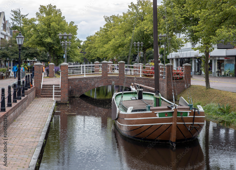 City of Papenburg Germany. Canal. Bridge. Old boat. City of Papenburg Germany. Canal. Bridge. Old boat.