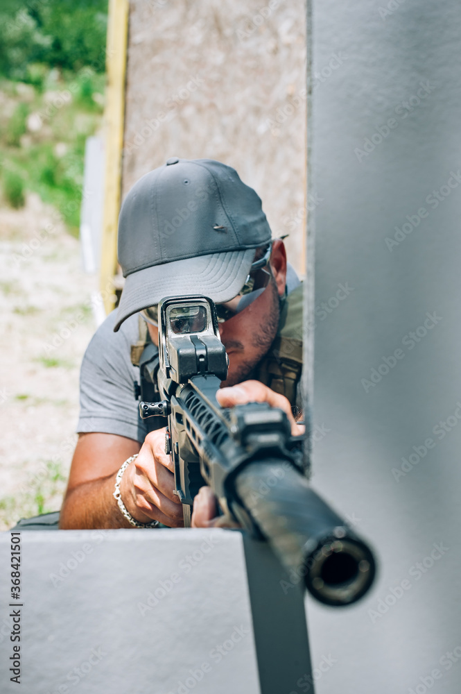 Rifle machine gun combat shooting training from behind and around cover