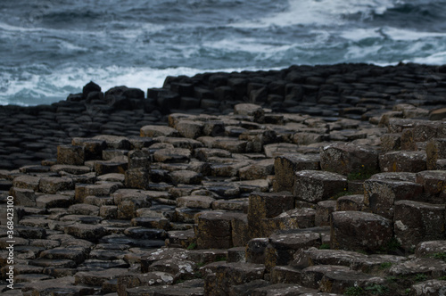 The Giant's Causeway in Northern Ireland, hexagonal rocks on the coast.