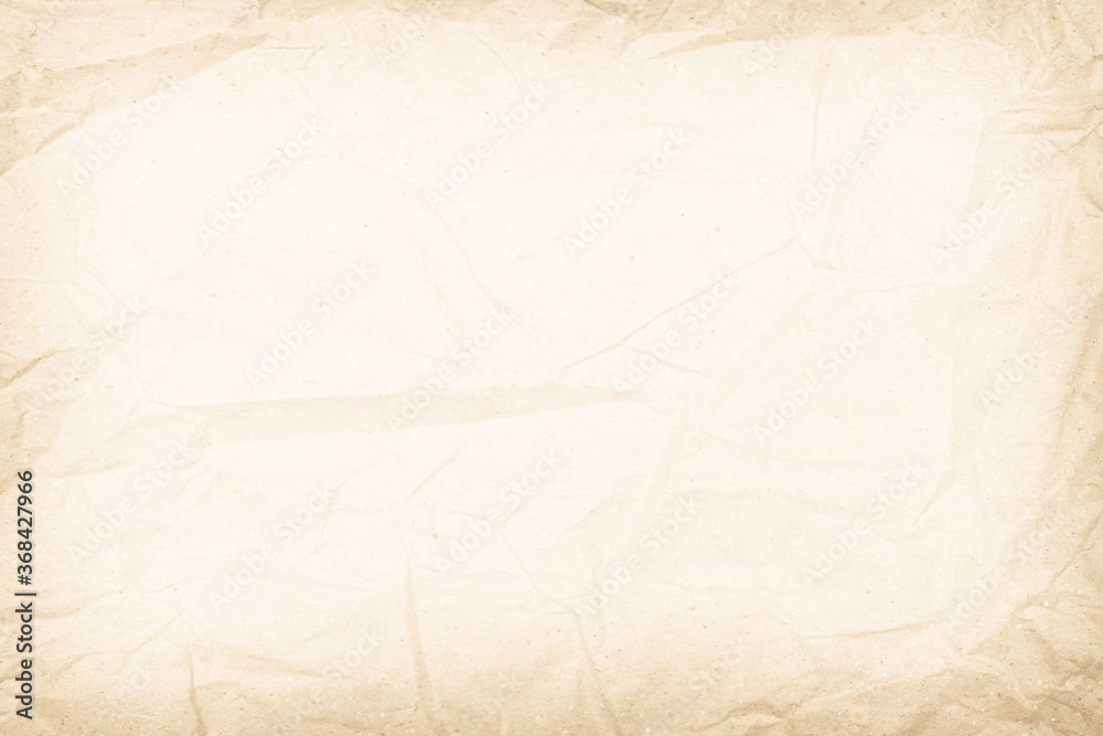 Brown recycled paper crumpled texture background. Cream Old vintage page or grunge vignette parchment old blank newspaper. Pattern empty rough cardboard creased grunge surface backdrop with space. Brown recycled paper crumpled texture background. Cream Old vintage page or grunge vignette parchment old blank newspaper. Pattern empty rough cardboard creased grunge surface backdrop with space.