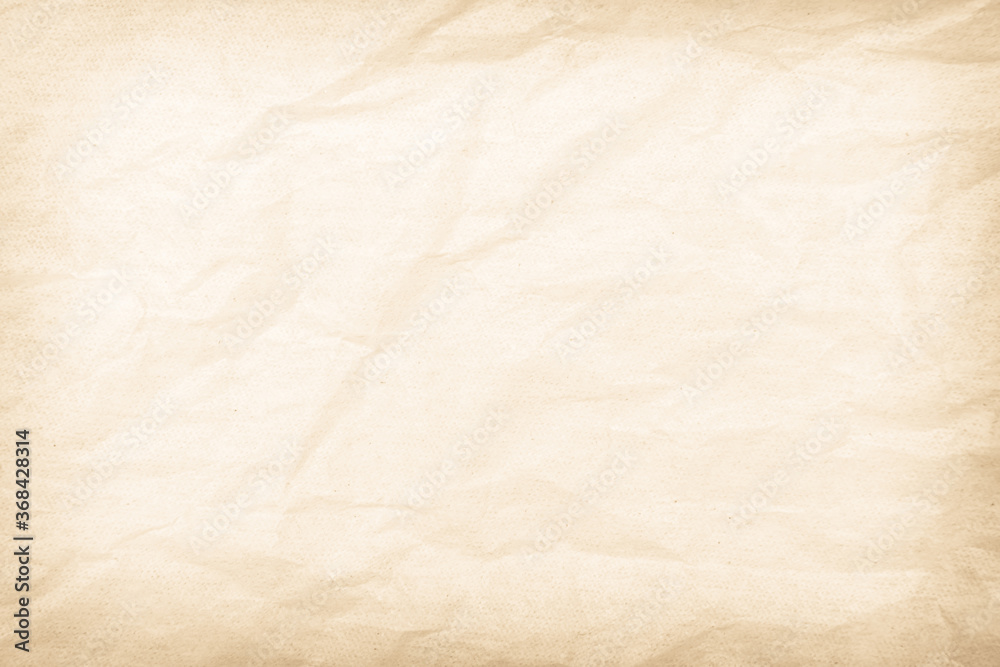 Brown recycled paper crumpled texture background. Cream Old vintage page or grunge vignette parchment old blank newspaper. Pattern empty rough cardboard creased grunge surface backdrop with space.