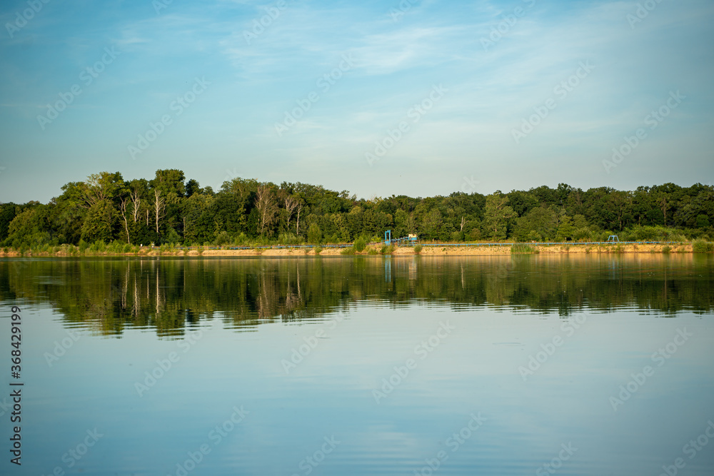 Fototapeta premium lake in the forest, flooded quarry