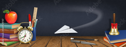Back to school. Knowledge Day horizontal banner. School supplies books, colored pencils, pens, alarm clock, apple, globe, flying paper plane. Empty space for text. 3D realistic illustration. Vector.