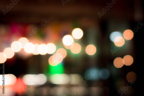 Blur the lights at the restaurant Blurred background with orange, red, light, blue, green, pink bokeh.