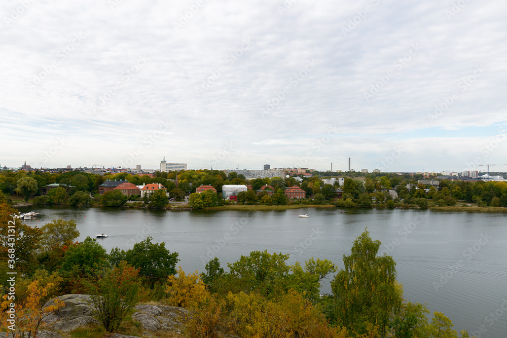View of park and lake against beautiful sky in Stockholm Sweden