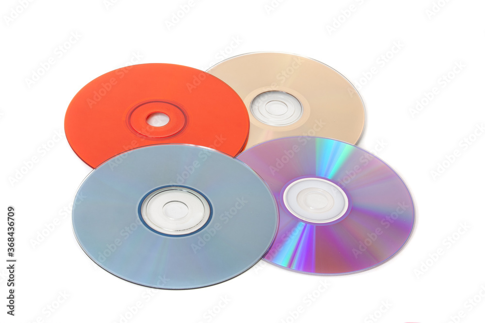Several multi-colored CDs on a white background Several multi-colored CDs on a white background