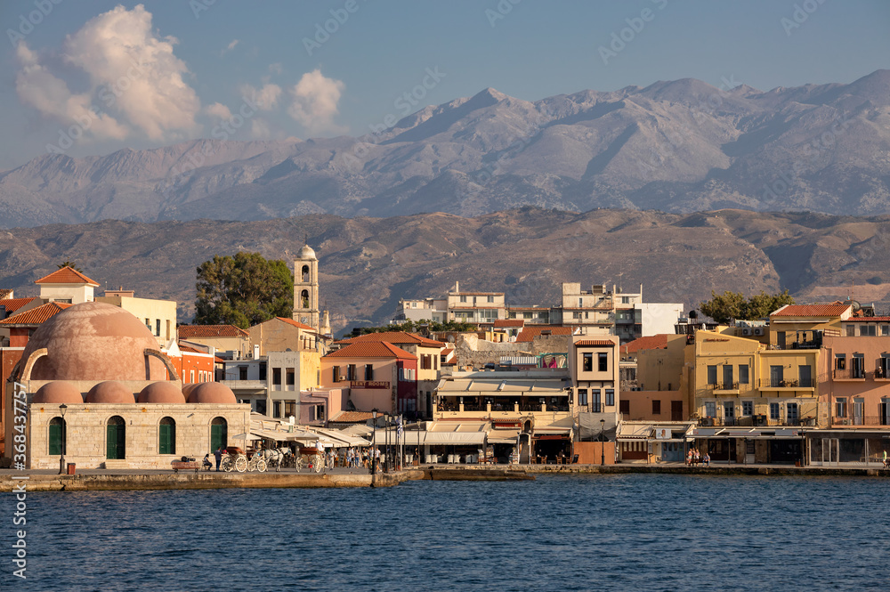 Chania harbour with White Mountains in the background.